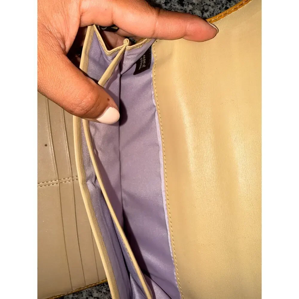 Coach features vertical yellow